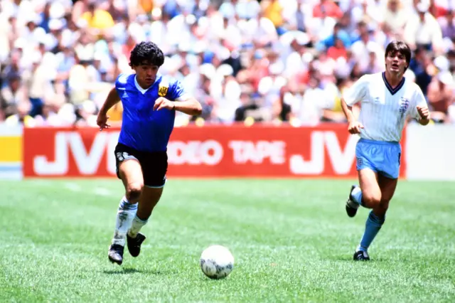 Maradona runs with the ball