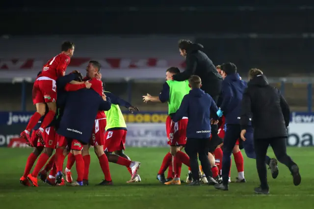 Chorley celebrate their win over Peterborough United