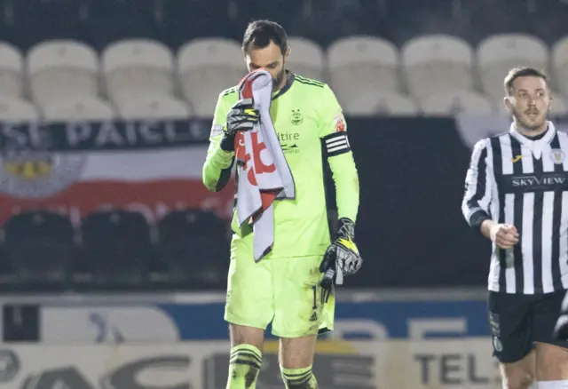 Joe Lewis cuts a dejected figure at full-time