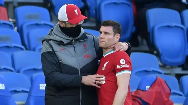 James Milner and Jurgen Klopp