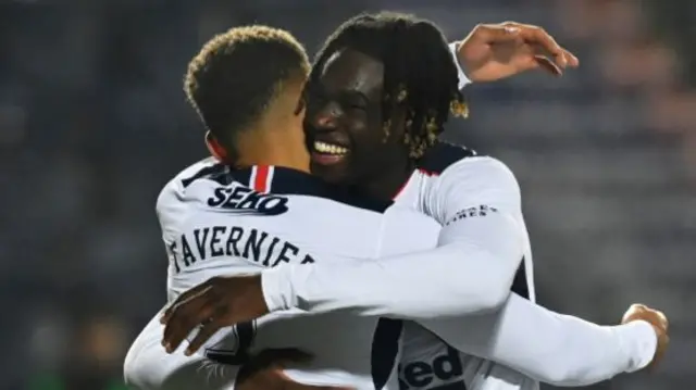 Rangers' James Tavernier and Calvin Bassey celebrate