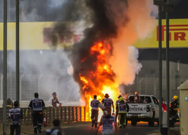 Grosjean's car on fire after the crash