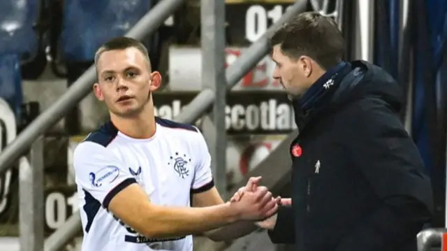 Ciaran Dickson and Rangers manager Steven Gerrard