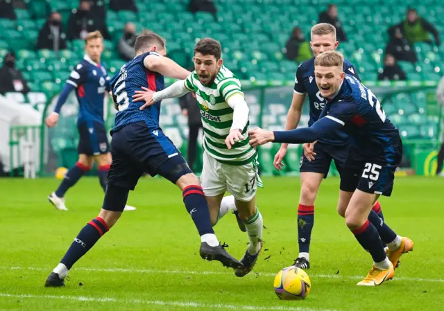 Celtic's Ryan Christie is brought down on the edge of the box by County's Callum Morris