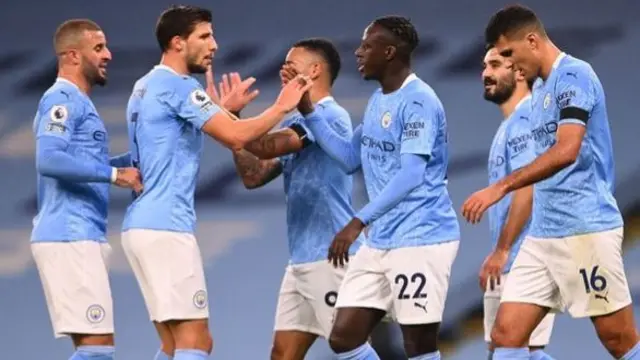 Man City players celebrate