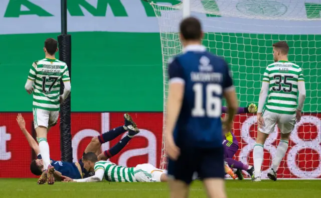 Celtic's Christopher Jullien pulls down Ross Stewart