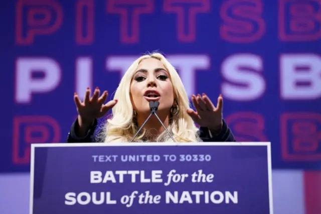 Lady Gaga speaks during a campaign rally for Joe Biden