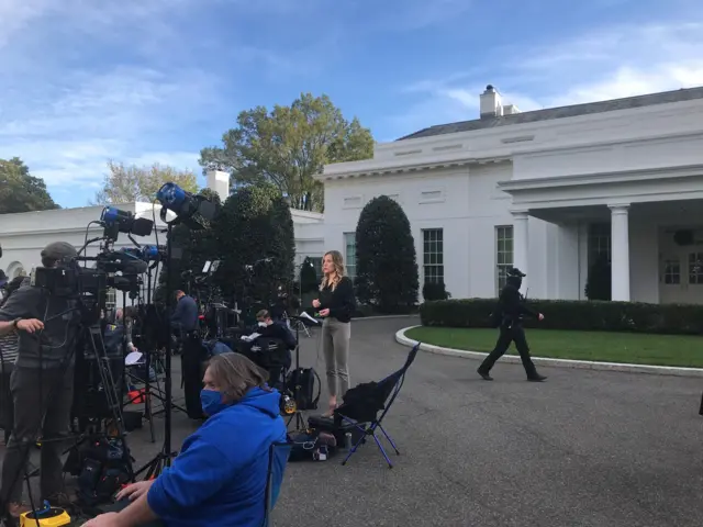 Reporters gathered near the White House