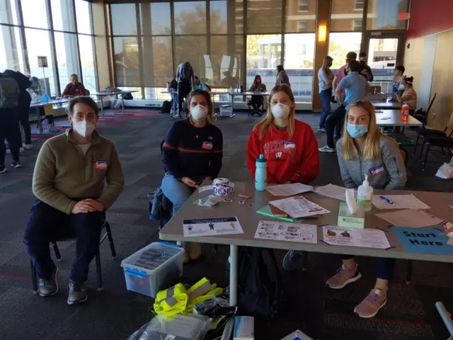 Angela Maloney and three other poll workers