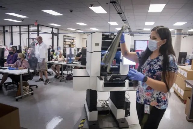 Tabulators check ballots in Phoenix, Arizona