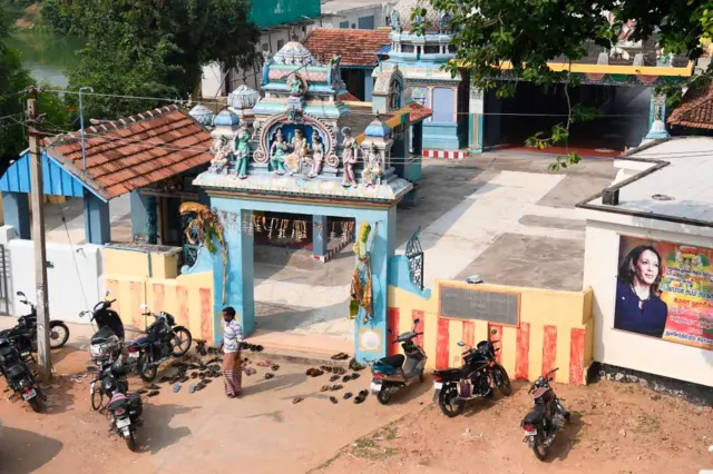 A poster of Democratic vice-presidential candidate, Kamala Harris, is displayed on a temple in Tamil Nadu, India