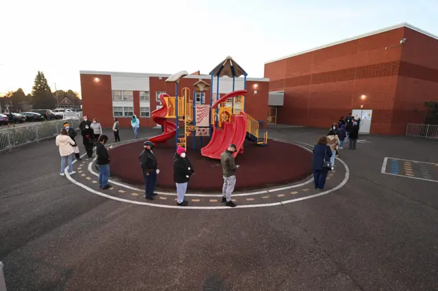 Voters line up at sunrise at Highland Elementary School in Ambridge, Beaver County, Pennsylvania, U.S. November 3, 2020