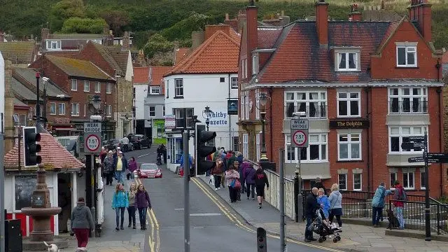 The swing bridge with people walking over