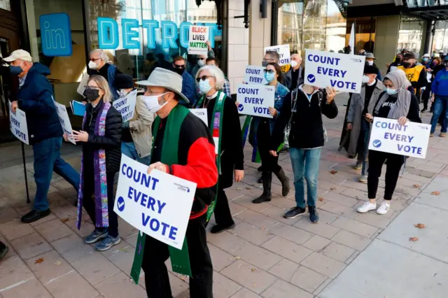 In Detroit, marches grew just as legal challenges to the vote were first beginning on Wednesday