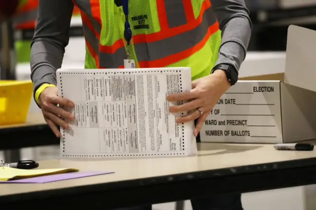 A worker in Pennsylvania counts ballots on Wednesday