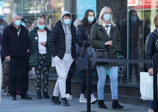 Shoppers queuing in Newcastle