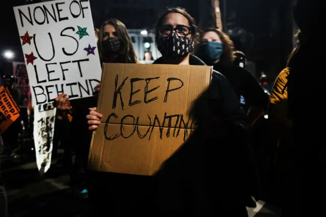 People participate in a protest in support of counting all votes as the election in Pennsylvania is still unresolved on November 04, 2020 in Philadelphia, Pennsylvania