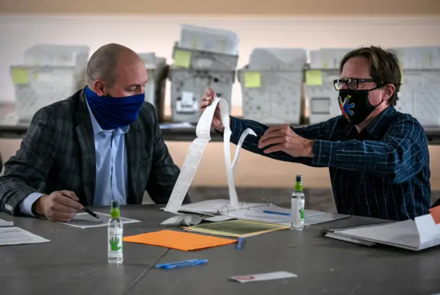 Michigan election officials counting ballots