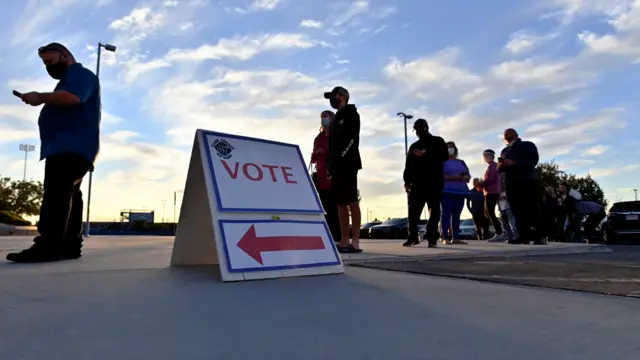 Voters line up prior to the opening of the polls in Las Vegas, Nevada, USA, 03 November 2020.