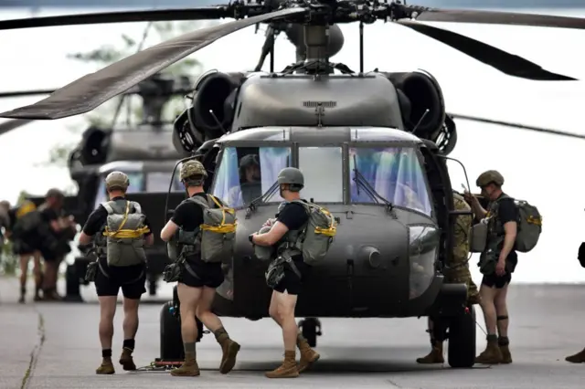 Soldiers board a helicopter in Georgia