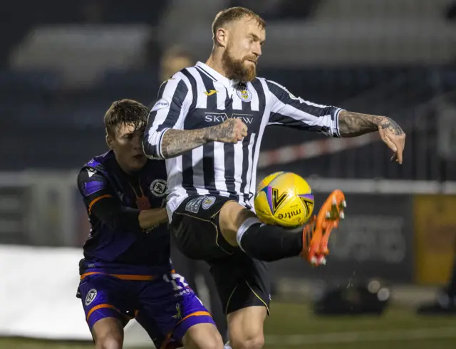 St Mirren's Richard Tait and Dundee United's Jamie Robson