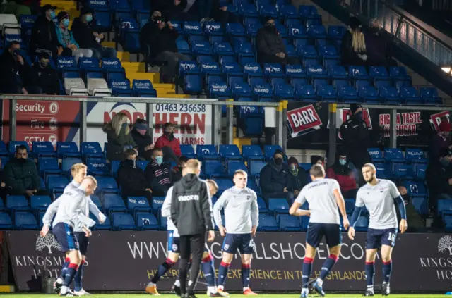 Ross County warm up in front of their fans