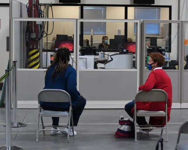 Observers from the campaigns oversee counting inside the building