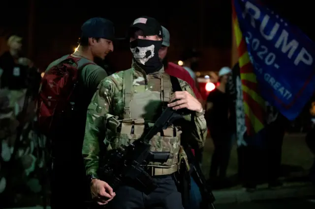 Protesters, some of whom are armed, have convened outside the vote counting centre in Phoenix, Arizona