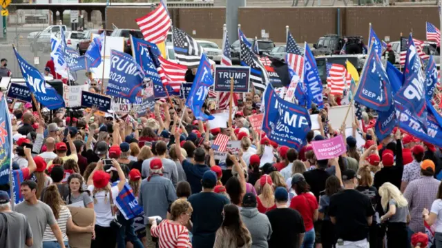 Supporters of President Donald Trump gather to protest the election results at the Maricopa County Elections Department office on November 6, 2020 in Phoenix, Arizona