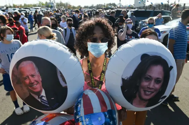 Balloons with Joe Biden and Kamala Harris's faces