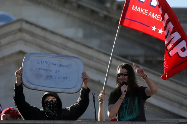 "Stop the Steal" protest organiser Scott Presler (R) speaks to supporters of U.S. President Donald Trump during a rally outside the State Capitol building following the 2020 U.S. presidential election, in Harrisburg, Pennsylvania, U.S., November 7, 2020