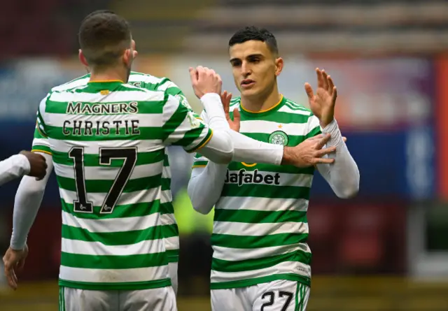 Mohamed Elyounoussi has fired a double for Celtic at Fir Park