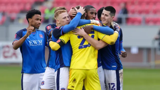 Carlisle hail keeper Marcus Dewhurst after his shoot-out saves