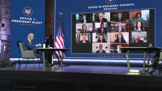 Joe Biden watching a briefing on Zoom from his Covid-19 advisory group