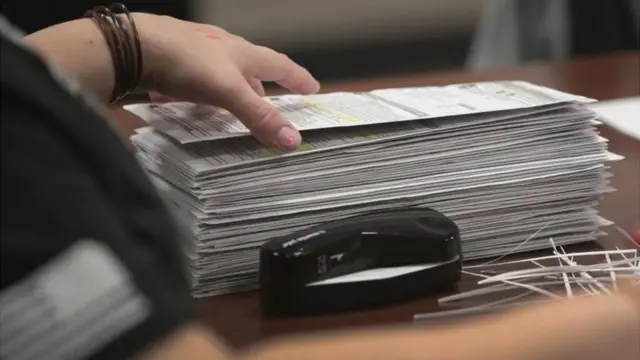 A pile of voting ballots