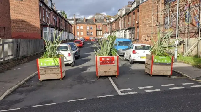 Planters and blocked road