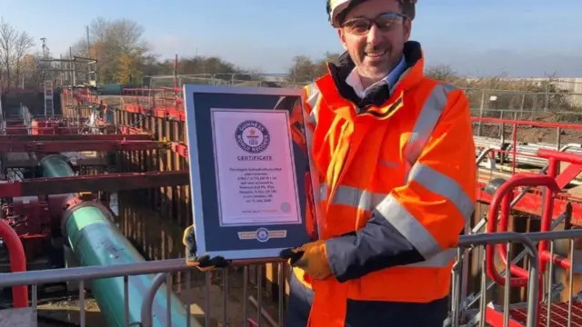 Steve Ellison from National Grid with certificate from Guinness World records