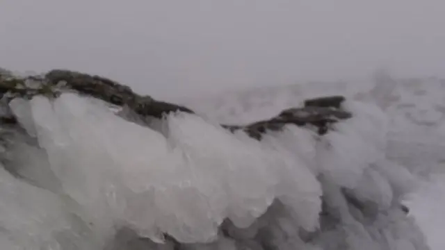 Summit shelter at Helvellyn with ice rime feathers