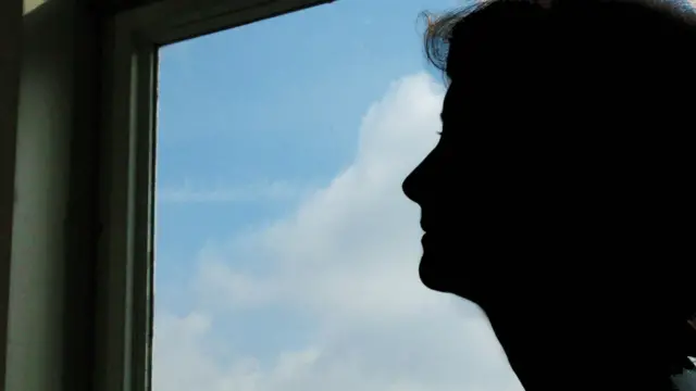 Generic picture of woman in silhouette