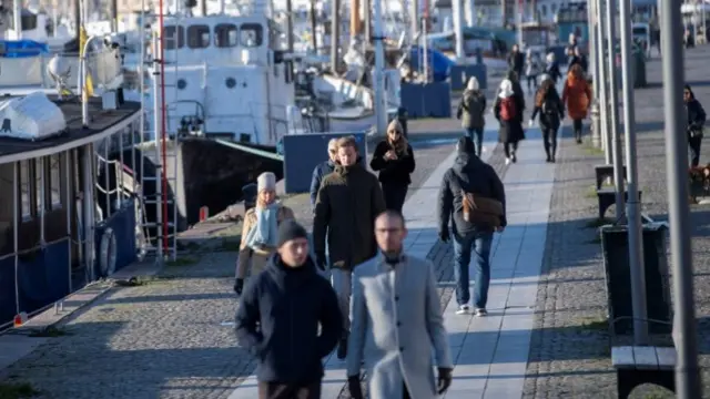 People walk in Stockholm, Sweden