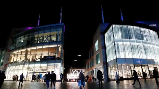 Shoppers near the Bullring shopping centre