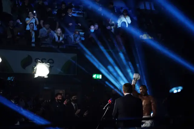 Anthony Joshua salutes the fans