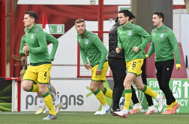 Hibs players going through their pre-match drills