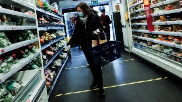 Shopper in supermarket