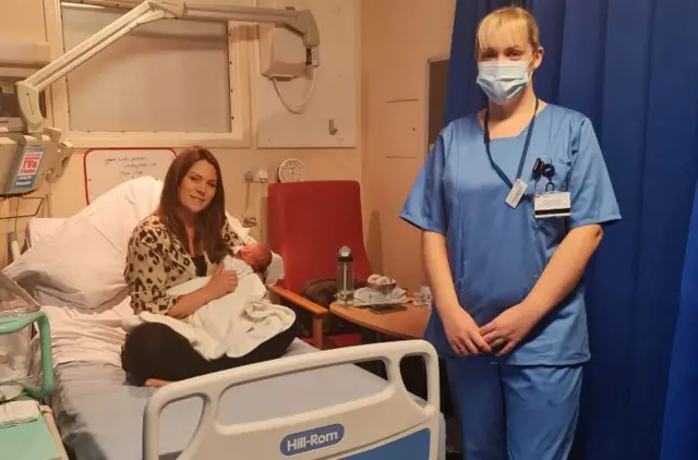 Midwife Nicola Mallinson with new mum Meggan Bowman and daughter, Isabella Grace