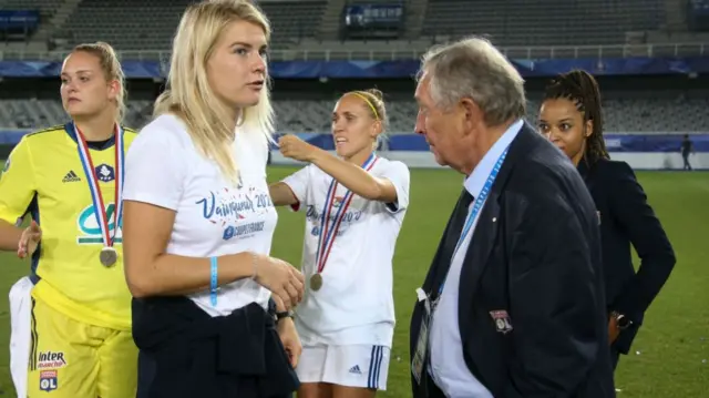 Ada Hegerberg of Lyon talks to ambassador of OL Gerard Houllier