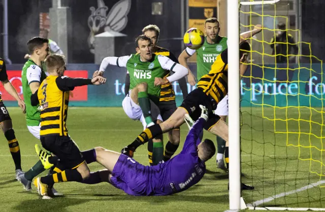 Hibernian's Christian Doidge (centre) makes it 1-1