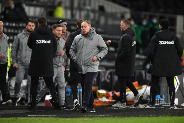 Swansea boss Steve Cooper dejected after the defeat by Derby