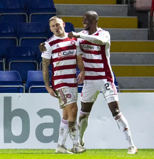 Scott Martin celebrates his goal with Hakeem Odoffin