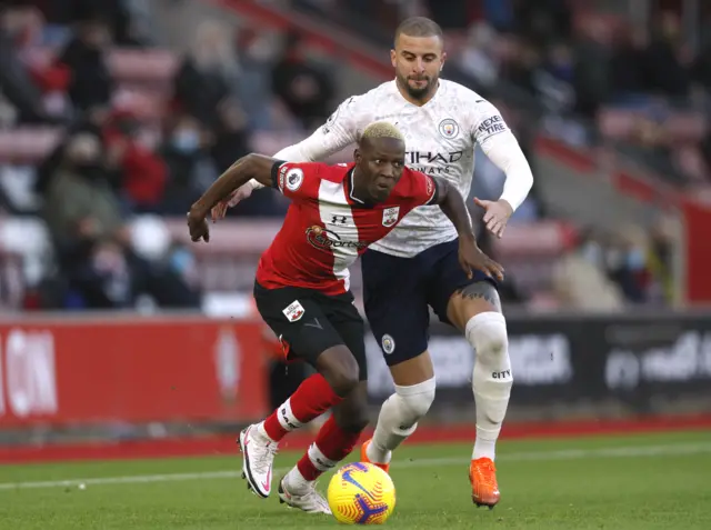 Moussa Djenepo and Kyle Walker